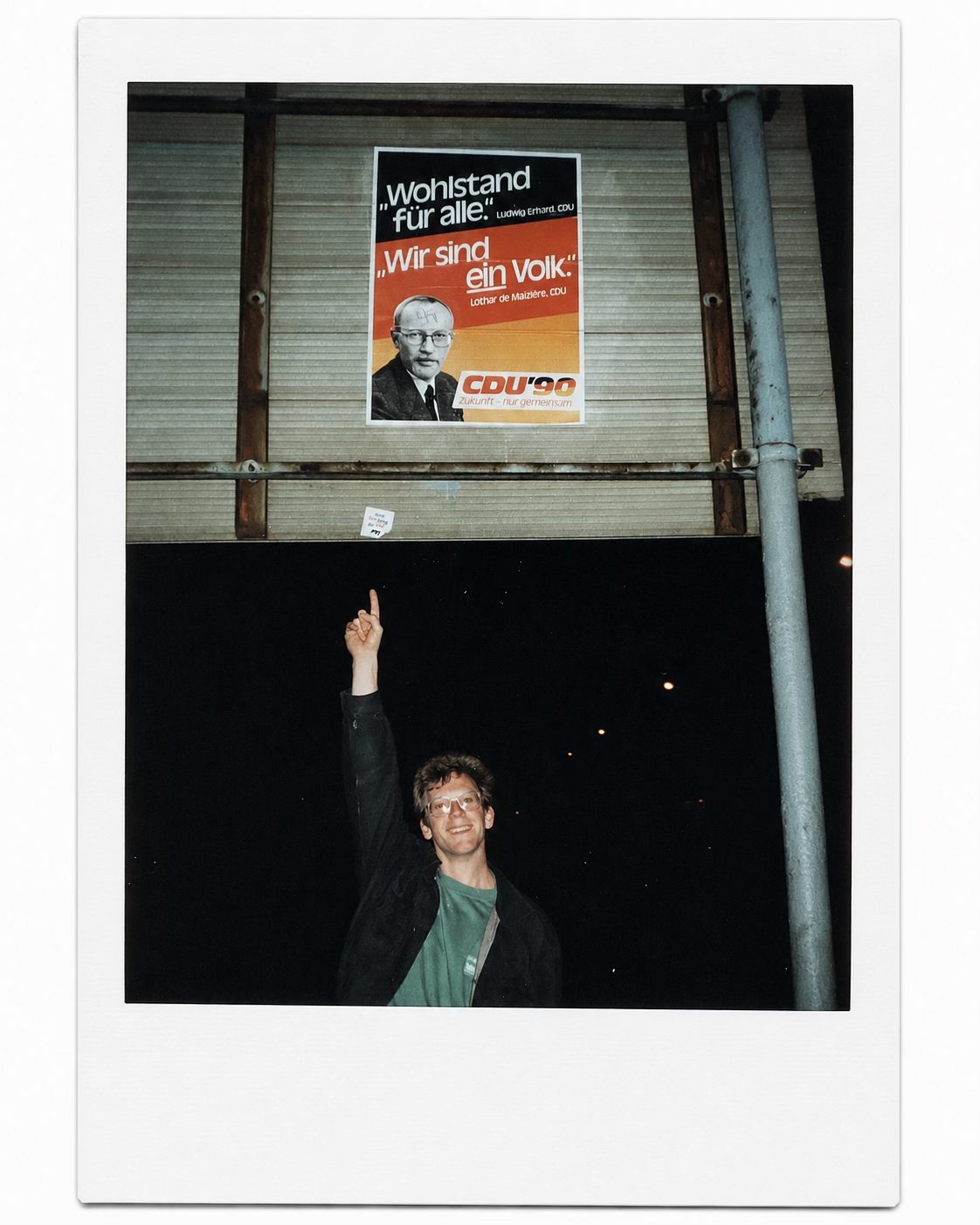Jim in Berlin, November 1989. The piece he chiselled from the Berlin Wall still sits beside his desk.