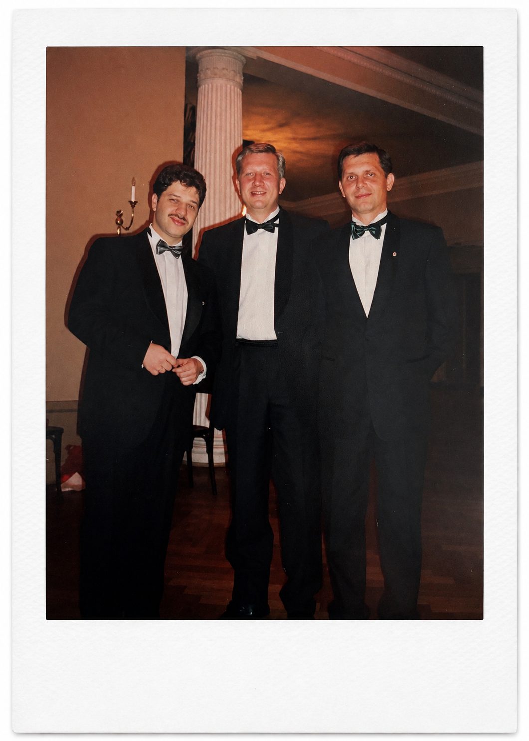 Leonid, left, at a reception marking the 10th anniversary of the bank where he began his career, 2002. 